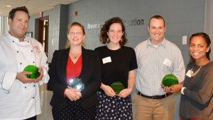 From left, staff recipient David Johnson, faculty recipient Danesha Seth Carley, student recipient Hannah Frank, and University Student Center representatives TJ Willis and Alyson Lee. Winners receive plaques made from recycled glass.
