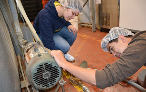 Students helped improve the efficiency and sustainability of the case washer, which Howling Cow uses to cleanse its milk storage cases.