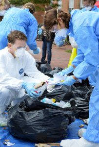 Students conducted a waste audit of all the discarded material in Nelson Hall as part of their analysis of sustainable operations.