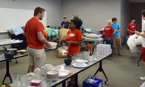 Volunteers and student shoppers at the Pack2Pack Store in SAS Hall on Aug. 14. More than 100 students connected with much-needed household items.