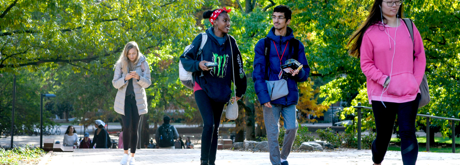 Students head from the Brickyard in the direction of Hillsborough Street on a pleasant November 2019 afternoon. Photo by Becky Kirkland.