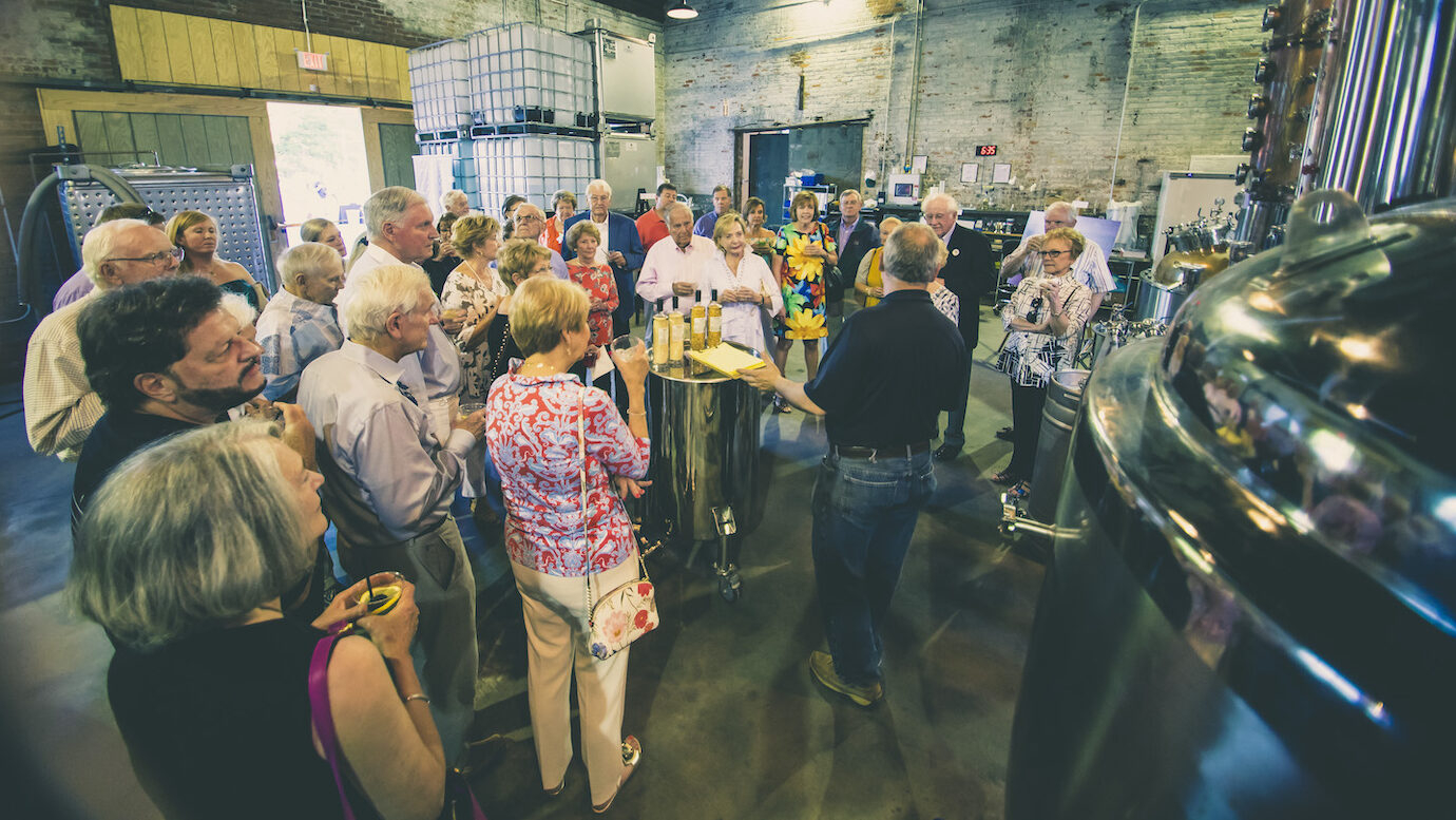people on a distillery tour