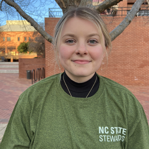 Headshot of Payton Bell in green NC State Stewards shirt.