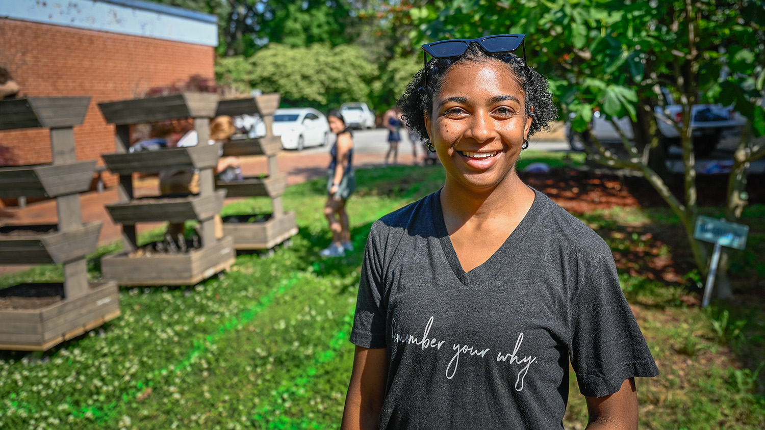 Young woman in garden smiling