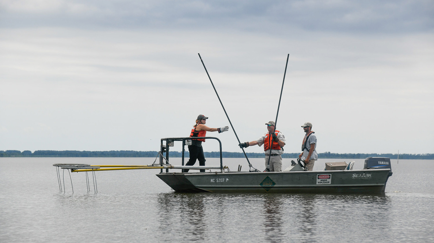 researchers on a boat