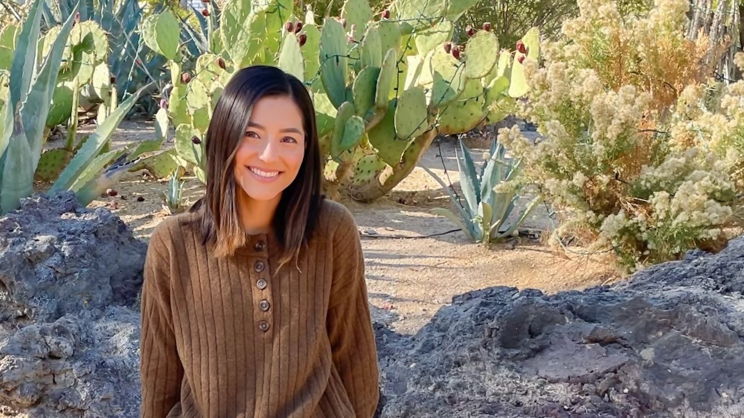 Julianna Duran-Jolley sitting near succulents