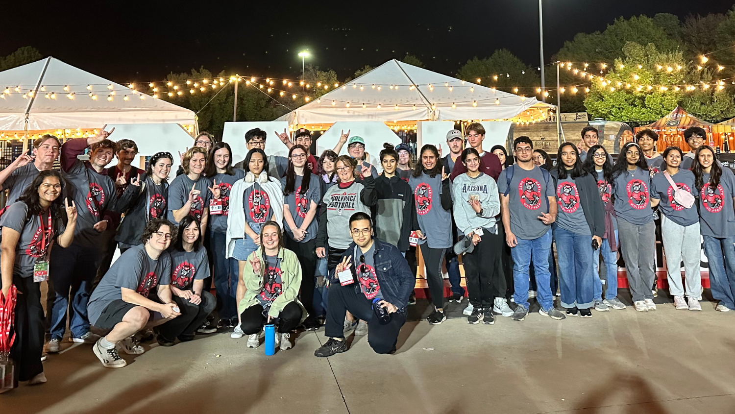 Zero Waste Wolfpack student volunteers at football game