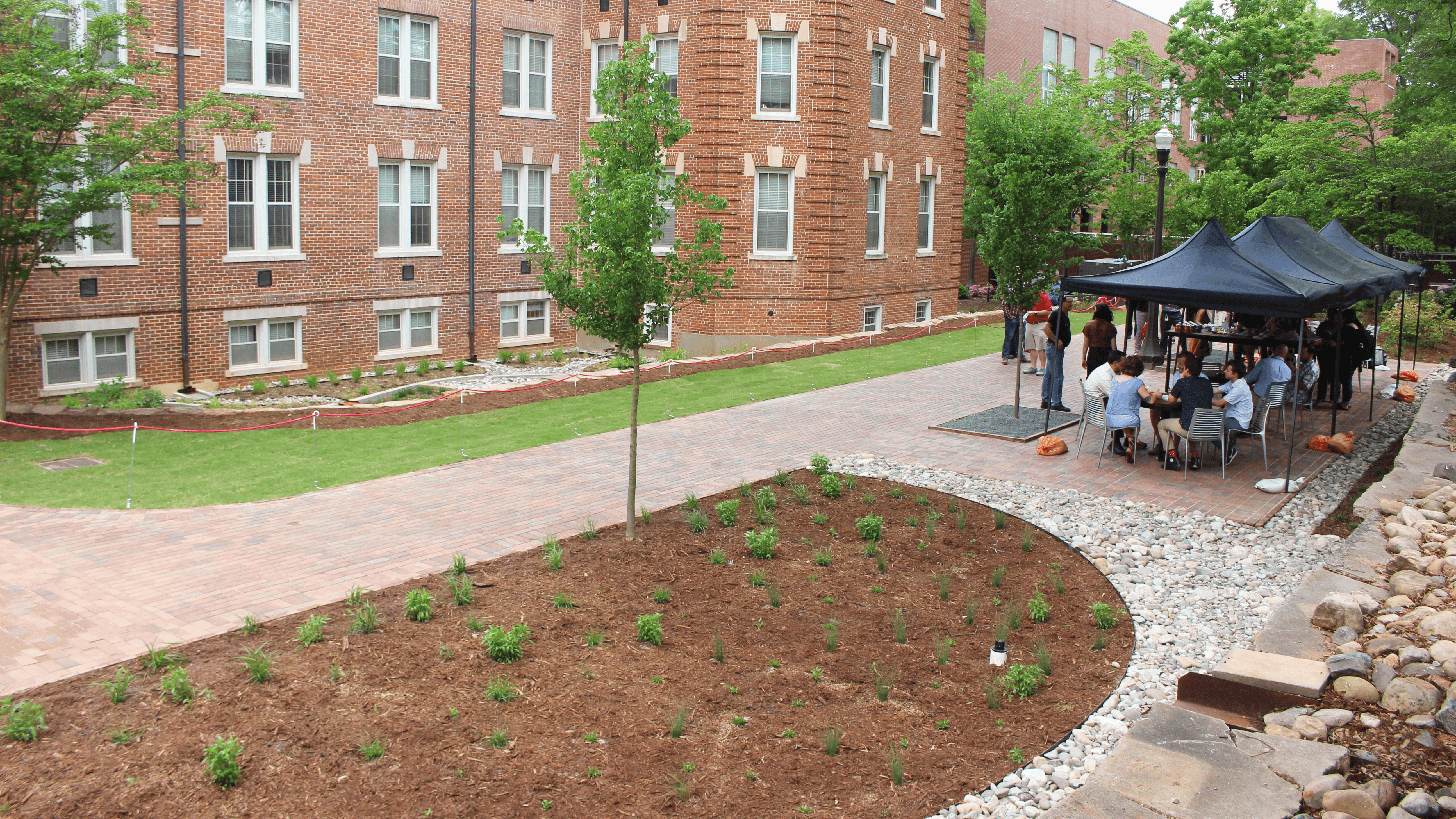 Syme Residence Hall student landscaping
